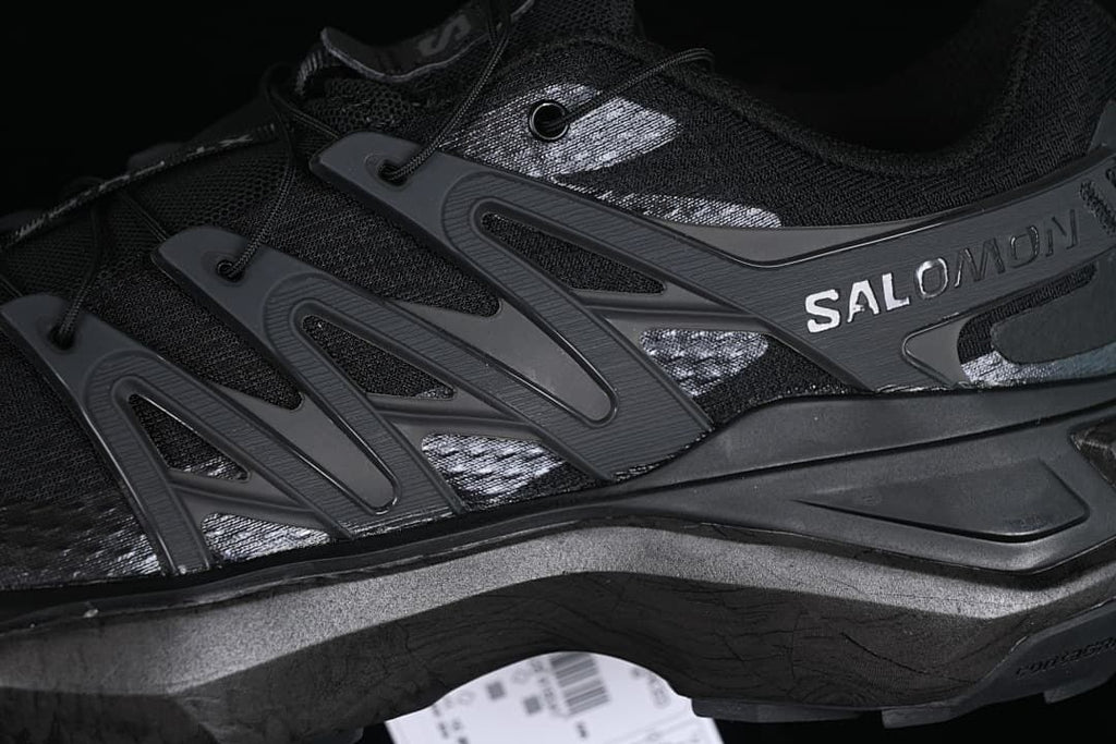 Close-up of the side panels, branding and dark upper.