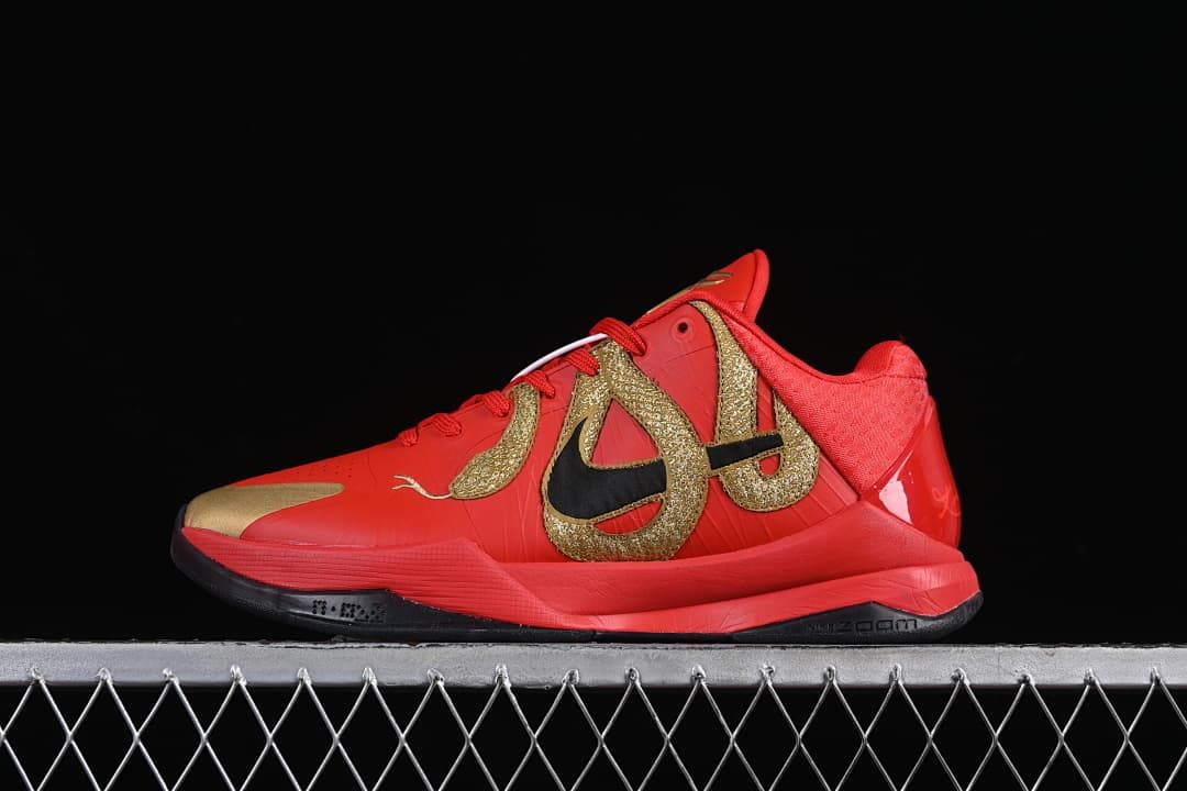 Side view of red and gold Kobe V Protro low-top basketball shoe