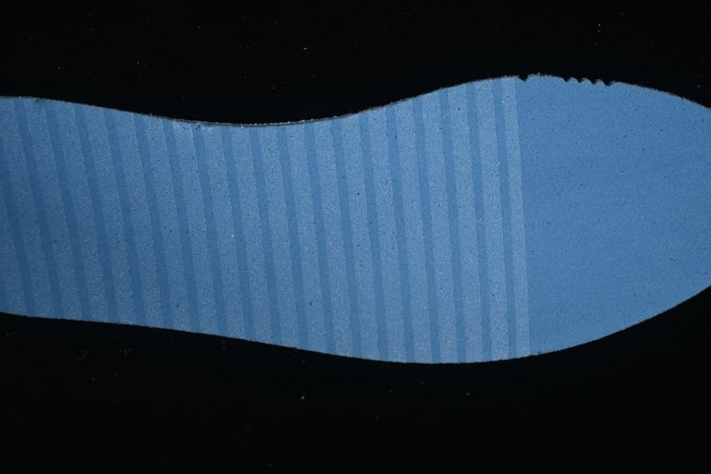 Close-up of a blue shoe insert or packing material