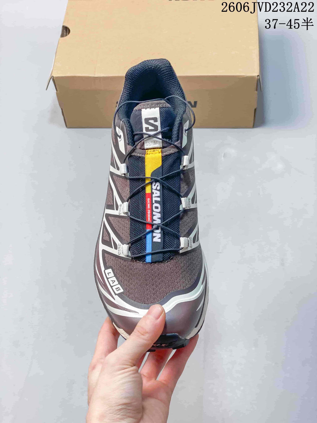 Front view of the Salomon XT-6 showing its cord lacing and tongue panel.