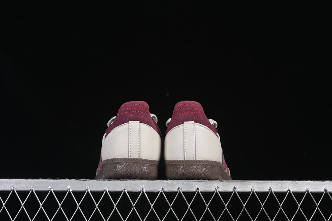 Rear view of the pair showing cream heel panels and burgundy heel tabs.