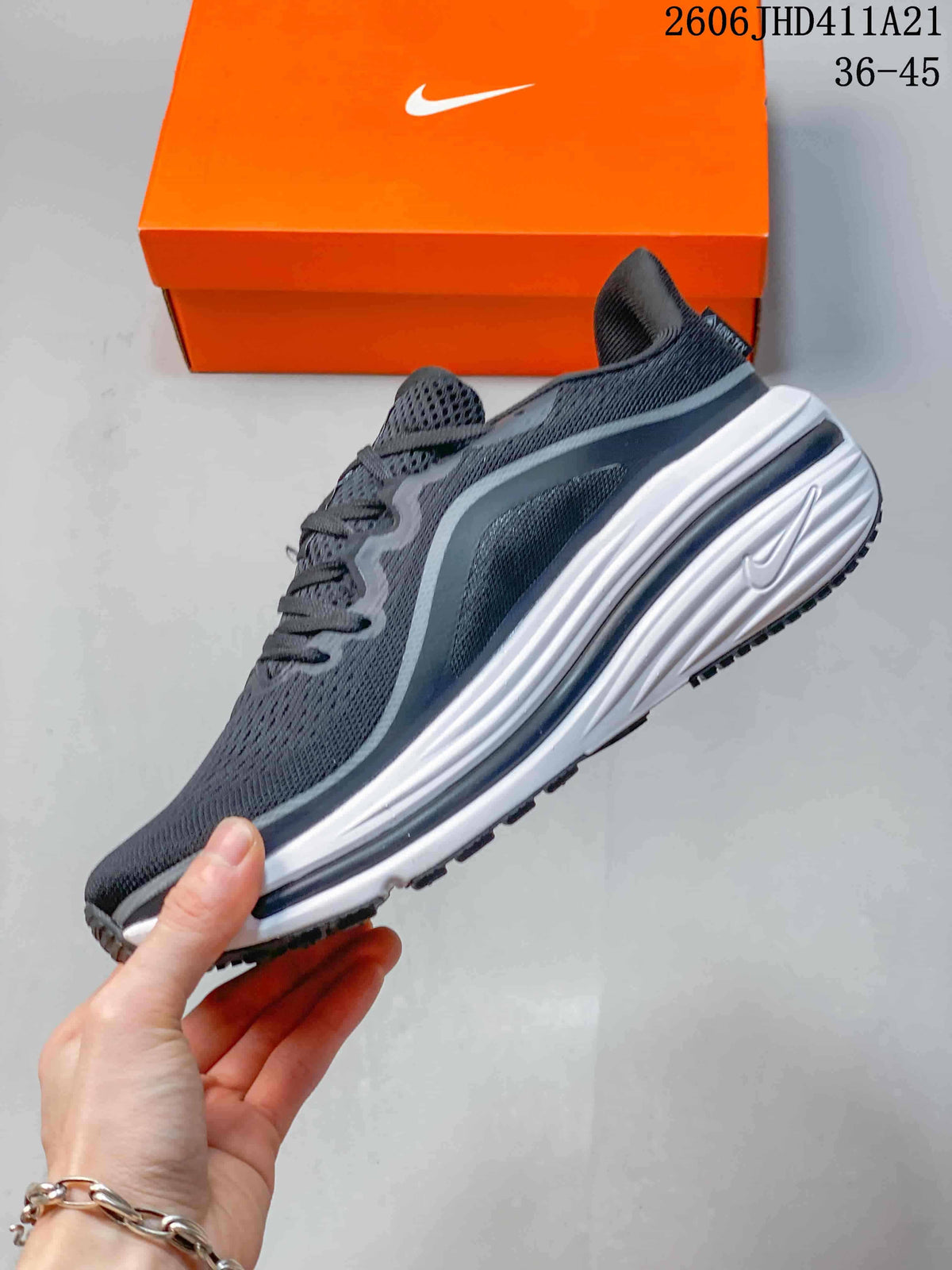 Side profile of a dark gray running shoe with light side detailing and a white midsole; image label shows 36–45.