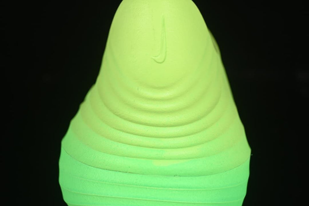 Close-up of the sculpted heel and back of the clog.