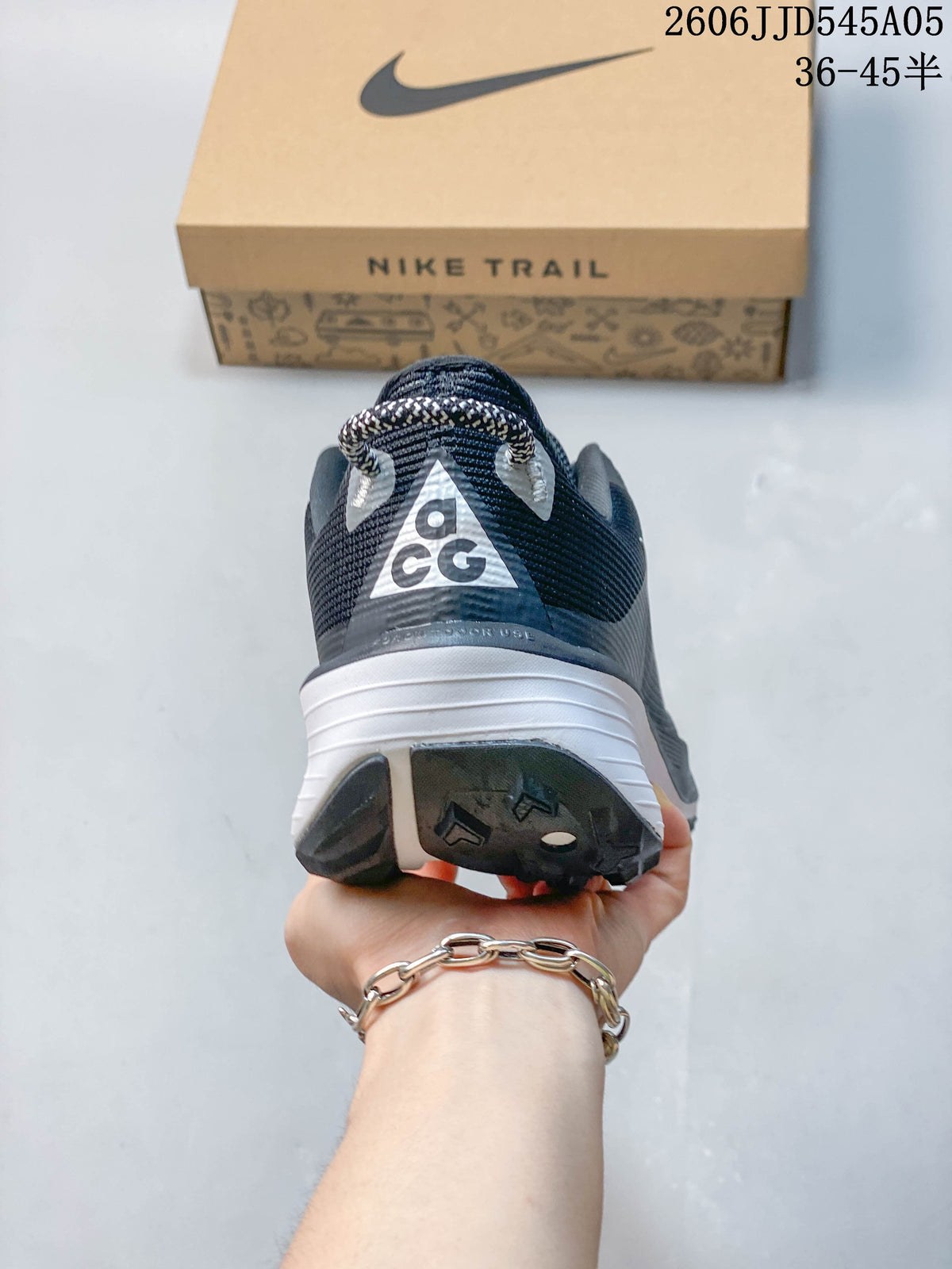 Rear view showing the heel of a dark gray Nike Pegasus Trail 6 shoe.