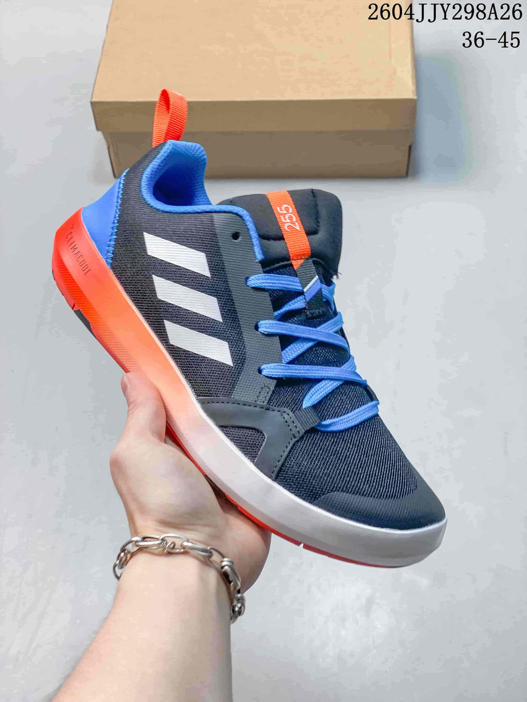 Navy and blue Adidas Terrex Boat shoe with white side stripes and orange accents.