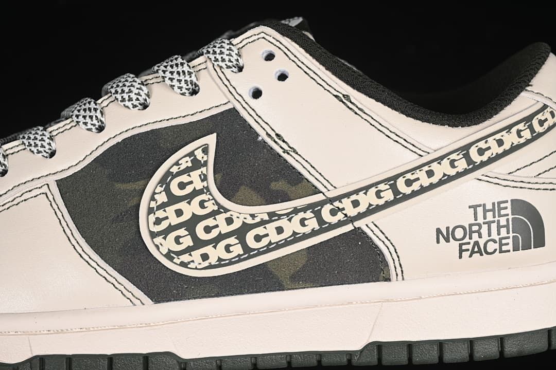 Close-up of patterned Swoosh detail and The North Face graphic