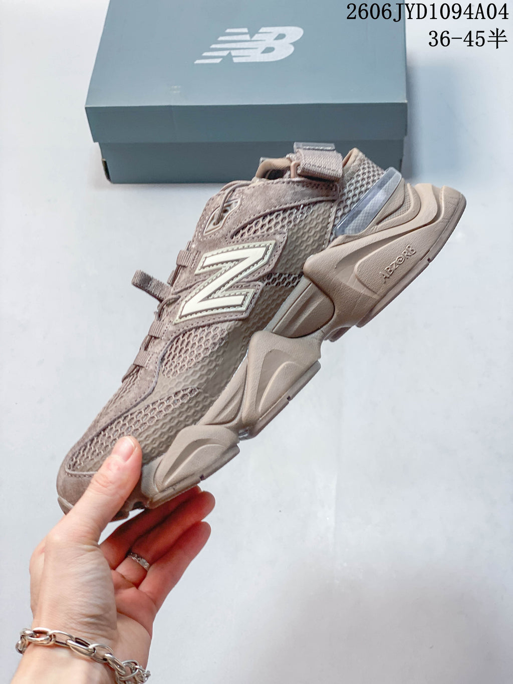 Side profile showing the layered upper and sculpted sole