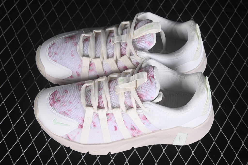 Overhead view of the pair showing the lace arrangement, padded collars, and pink patterned toe panels.