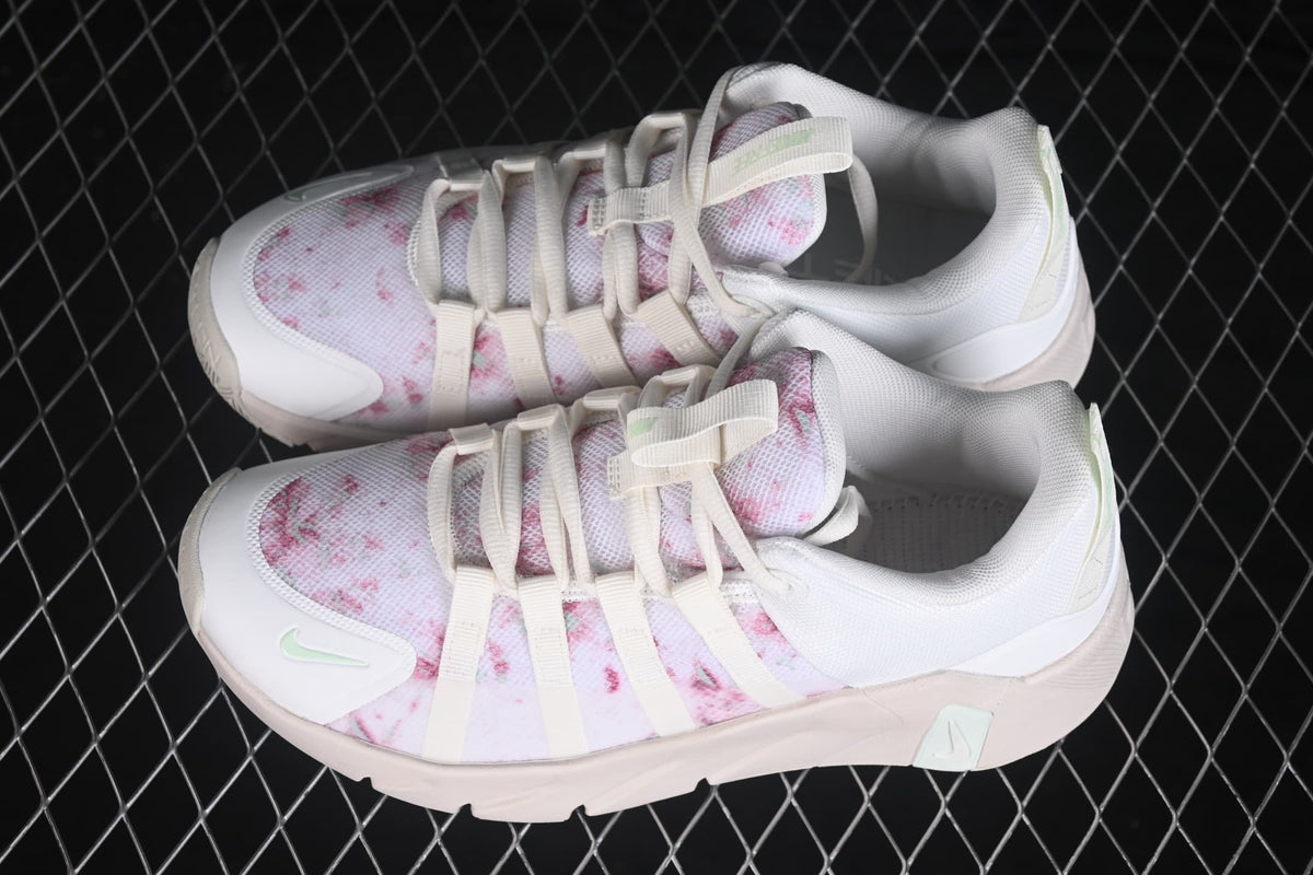 Overhead view of the pair showing the lace arrangement, padded collars, and pink patterned toe panels.