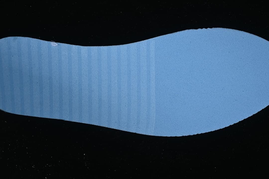 Blue sneaker outsole shown from below