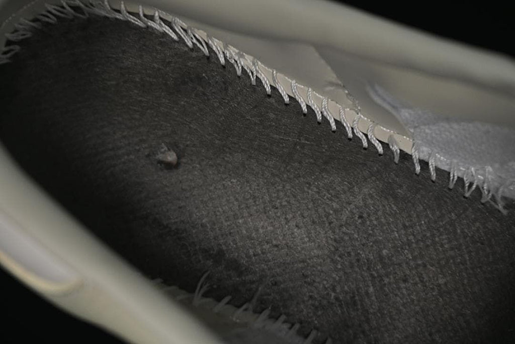 Close-up of the sneaker's interior stitching and lining.