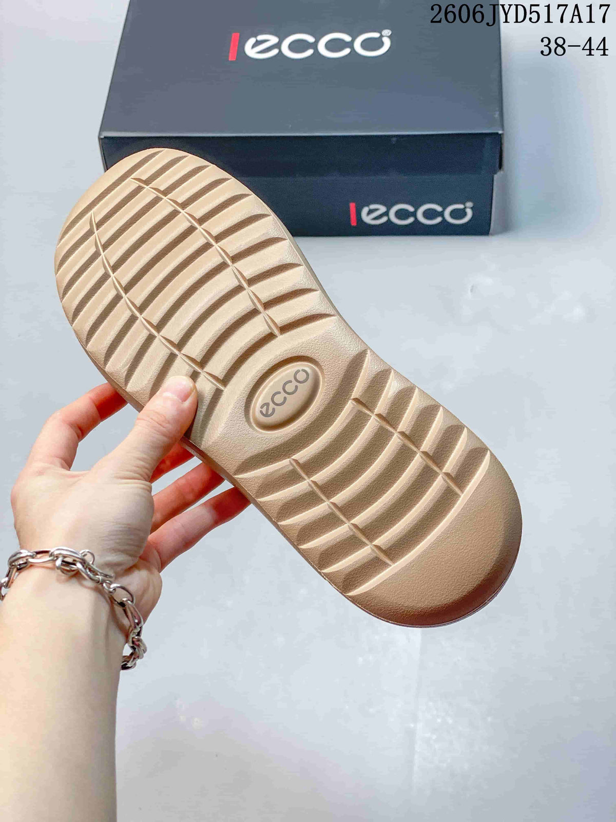 Close-up of the textured outsole on a beige shoe