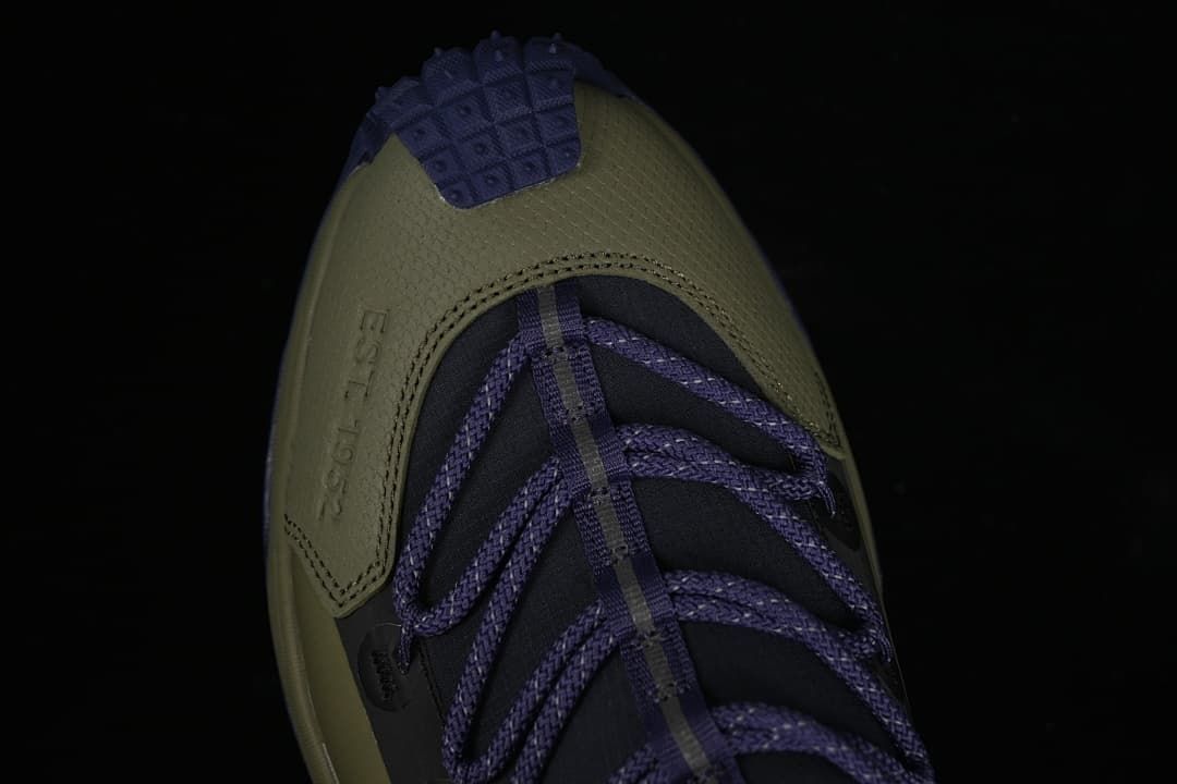 Top view of the olive toe and purple laces
