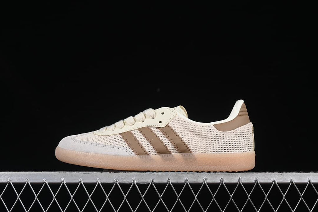 Side view of a beige and brown adidas Samba OG sneaker with a gum-colored outsole