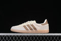 Side view of a beige and brown adidas Samba OG sneaker with a gum-colored outsole