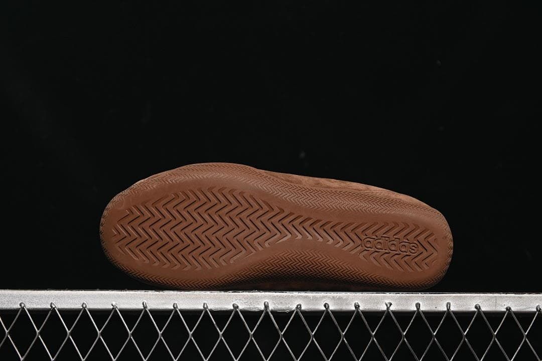 Underside showing the brown patterned outsole