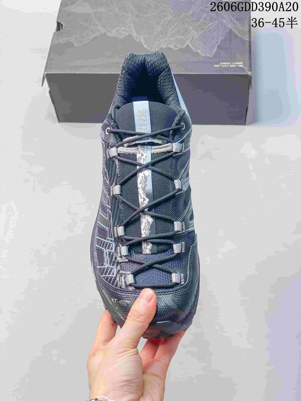 Top view of the Salomon XT-4K shoe showing its cord lacing and patterned center detail.