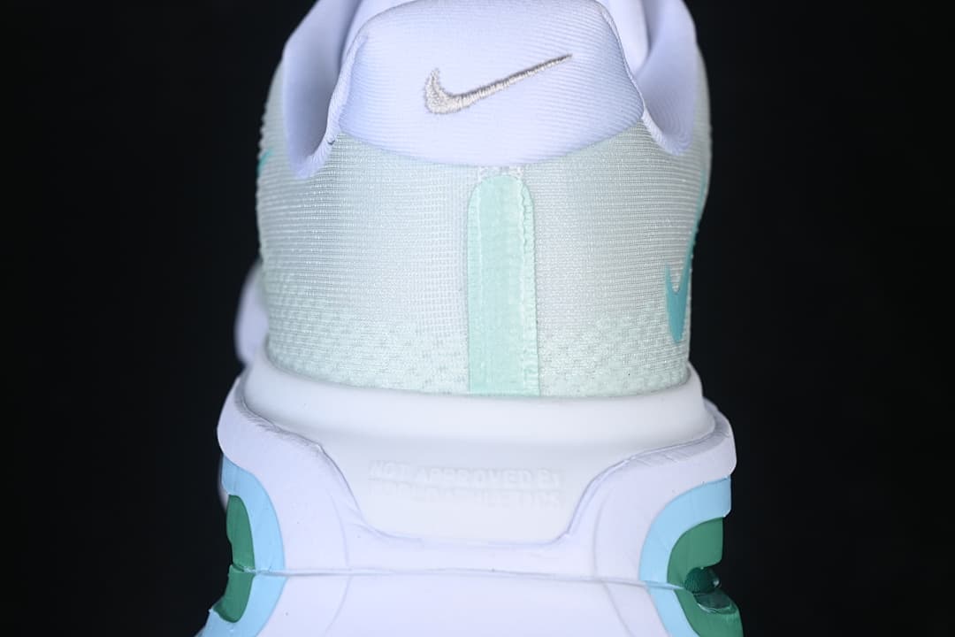 Close-up of the heel with a small swoosh and layered heel cushioning