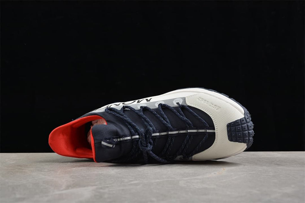 Top view of the sneaker showing its lacing, toe panel, and red-lined collar.