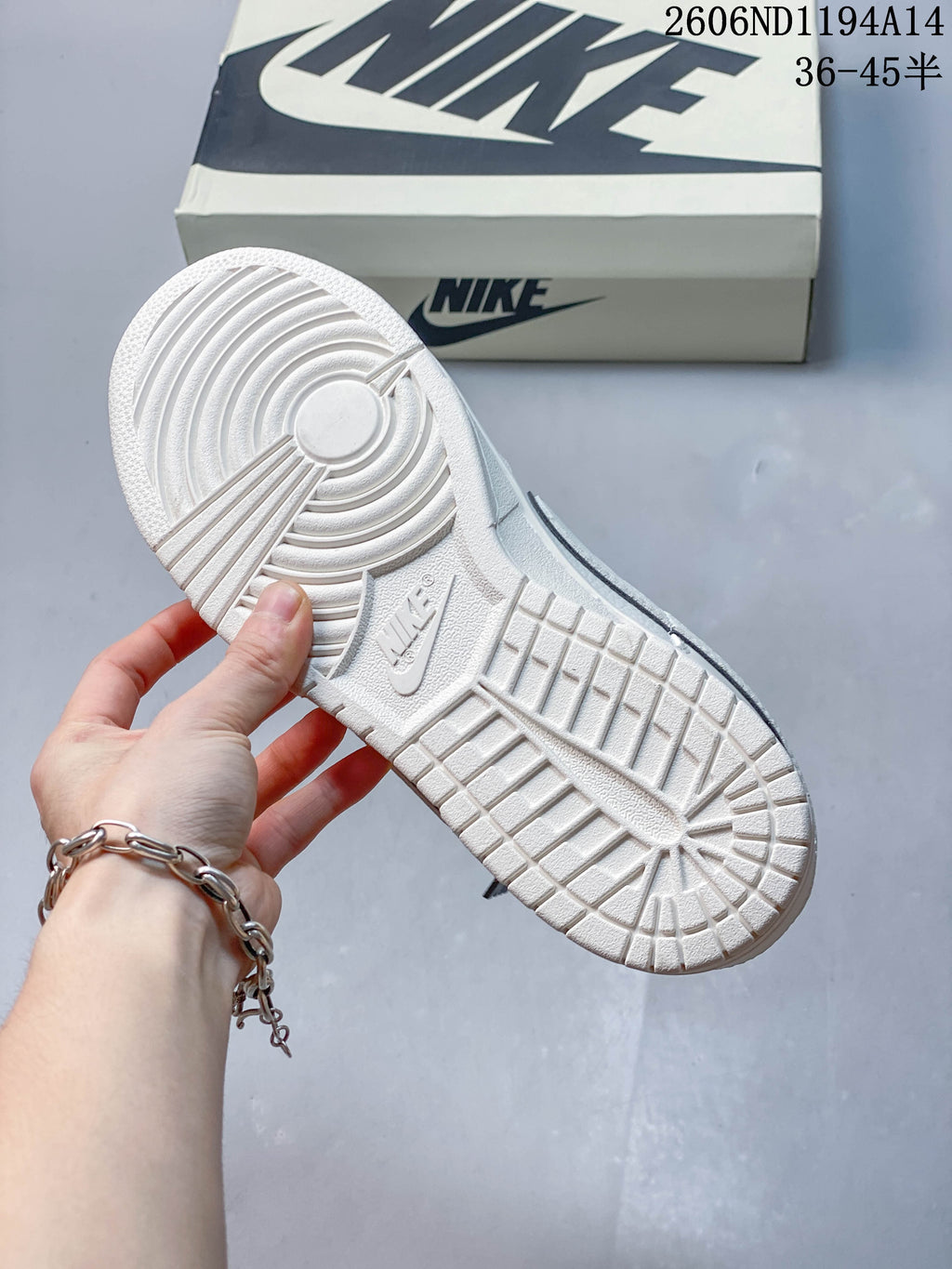 Close-up of the sneaker outsole with circular tread pattern