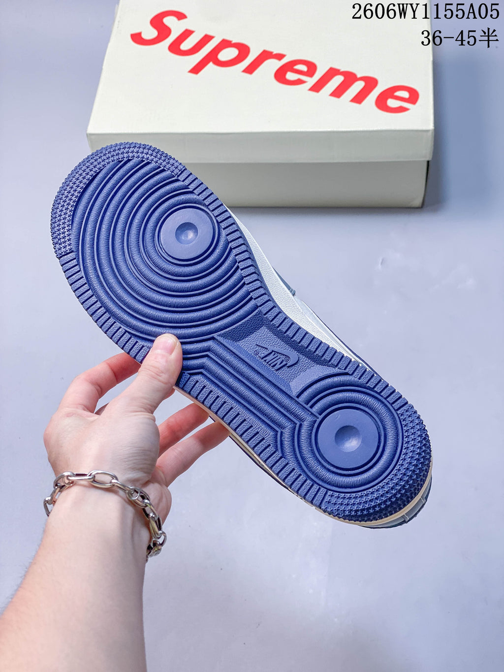 Close-up of the blue outsole and patterned tread