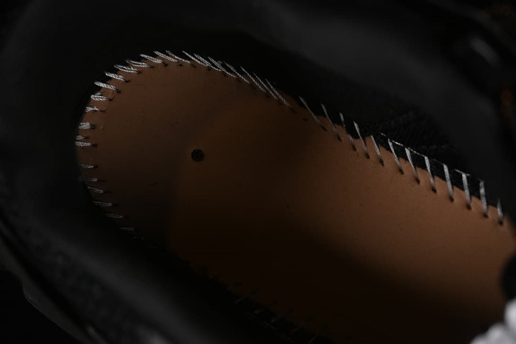 Interior construction detail of the shoe.