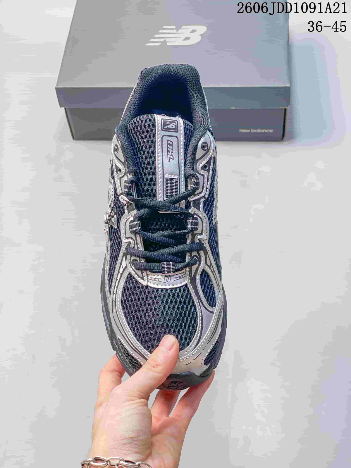 Top view of a New Balance 740 sneaker showing its laces and mesh panels