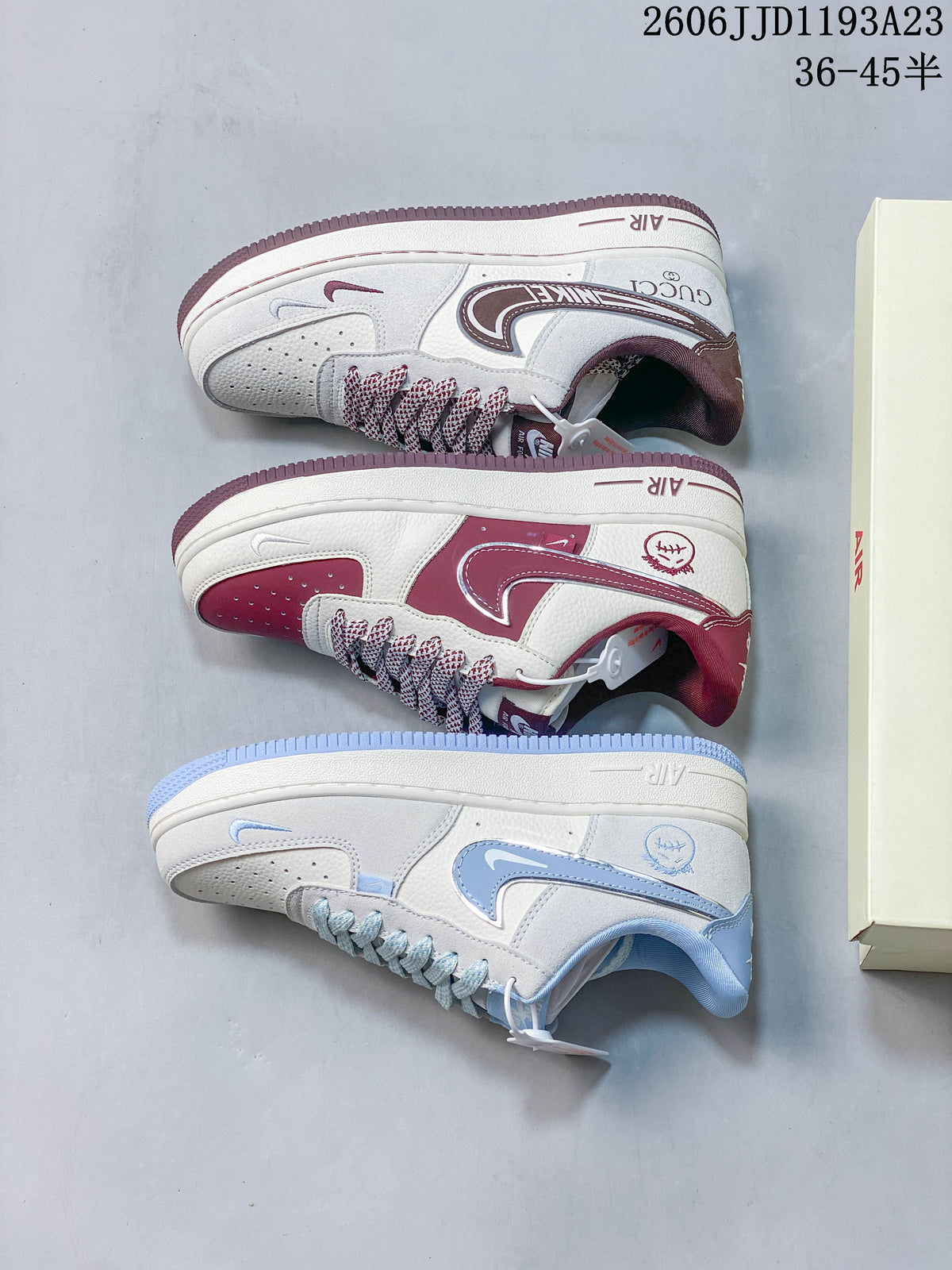 Three white sneaker color variations, including ice blue and burgundy
