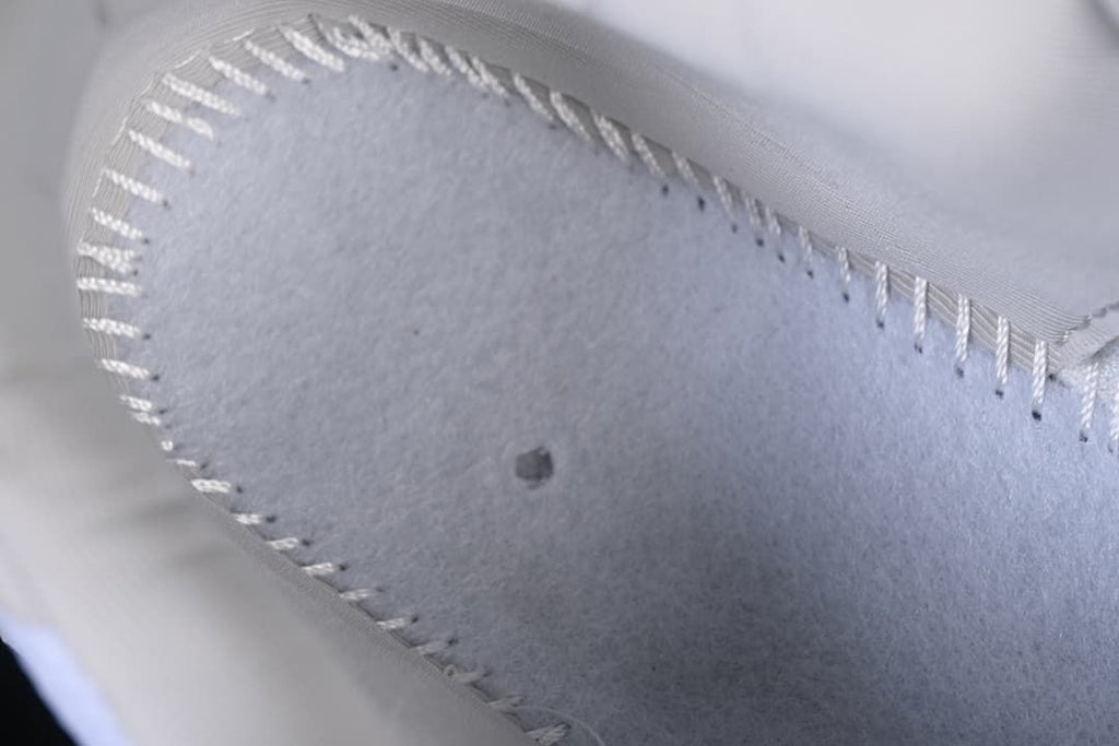 Close-up of the sneaker's inner lining and stitched construction.