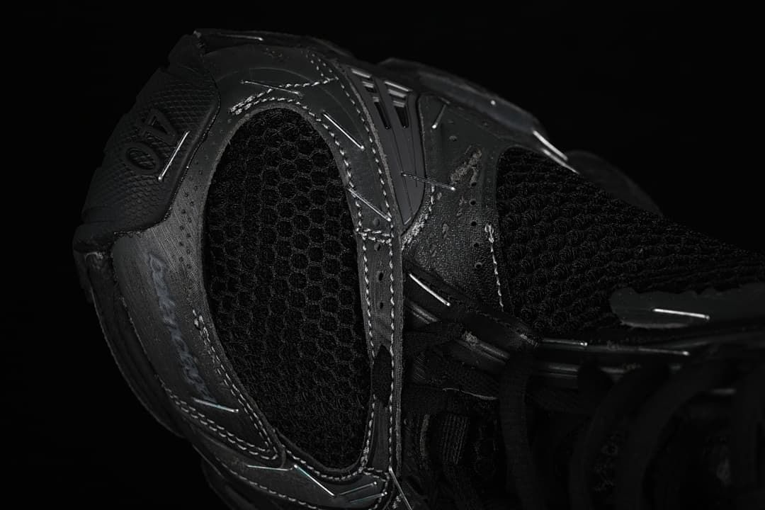Close-up of the rear quarter, mesh panel, and layered overlays.