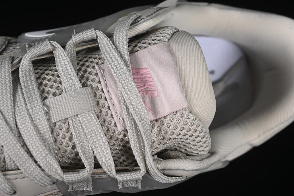 Close-up of grey laces and tongue label