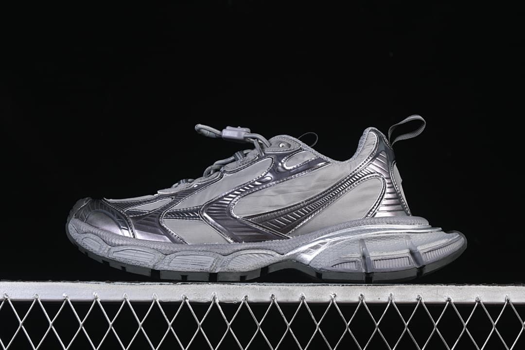 Side view of a grey Balenciaga Phantom sneaker with a chunky sole.