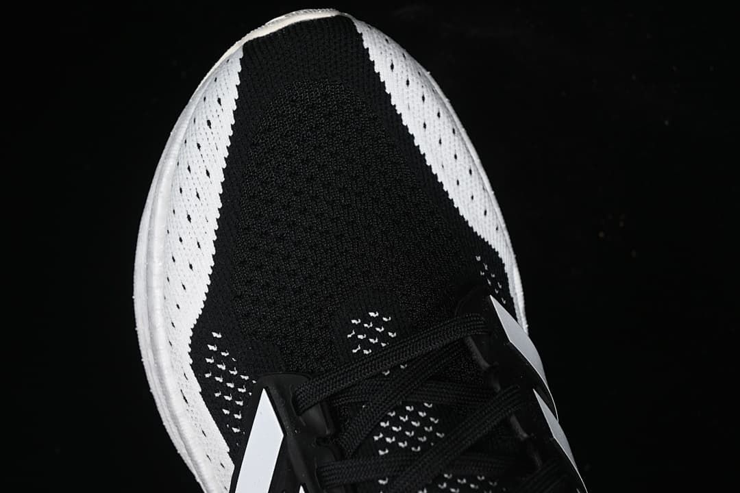 Top view showing the black upper and white perforated side panels
