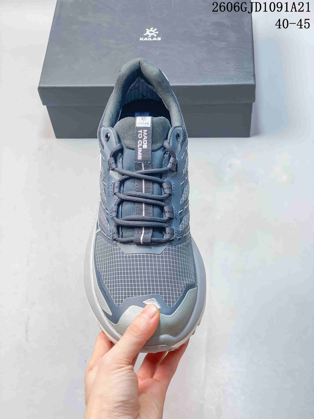 Top view showing the shoe's laces, tongue, and patterned toe area