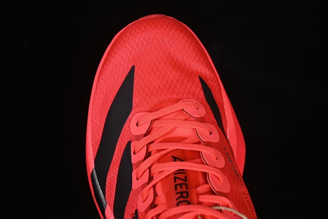 Top view of the coral shoe showing the toe and lace pattern