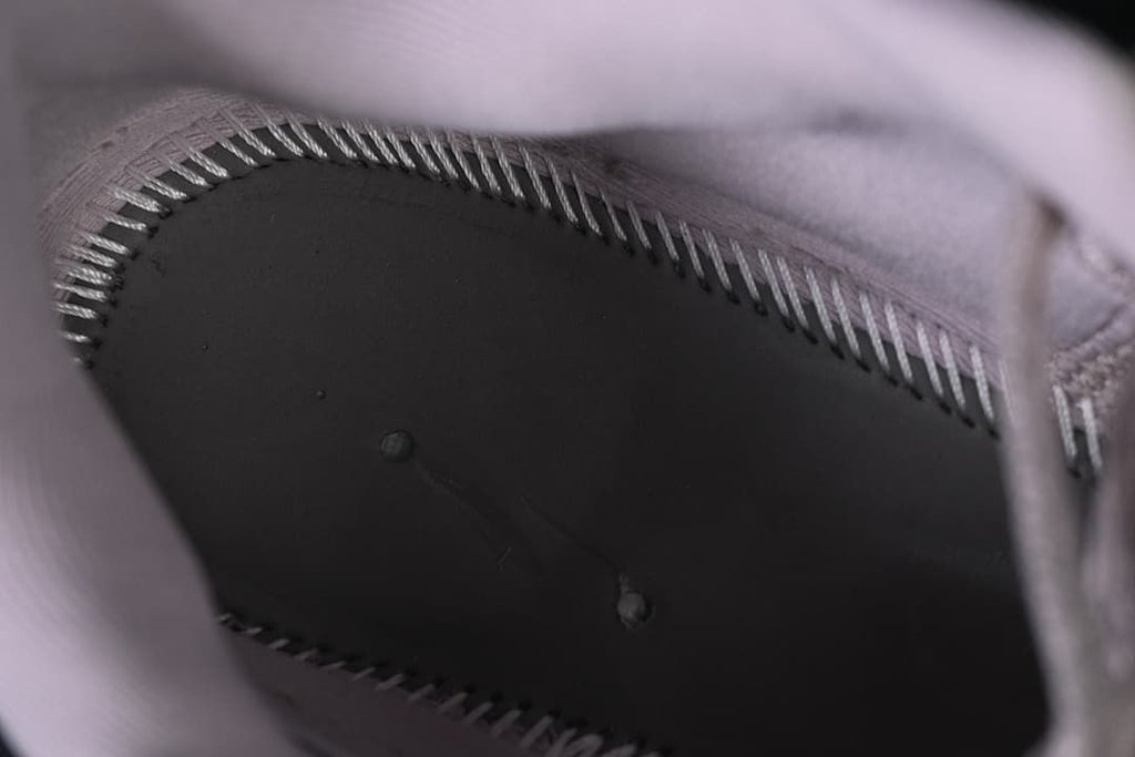 Close-up view inside the shoe showing the footbed and stitching