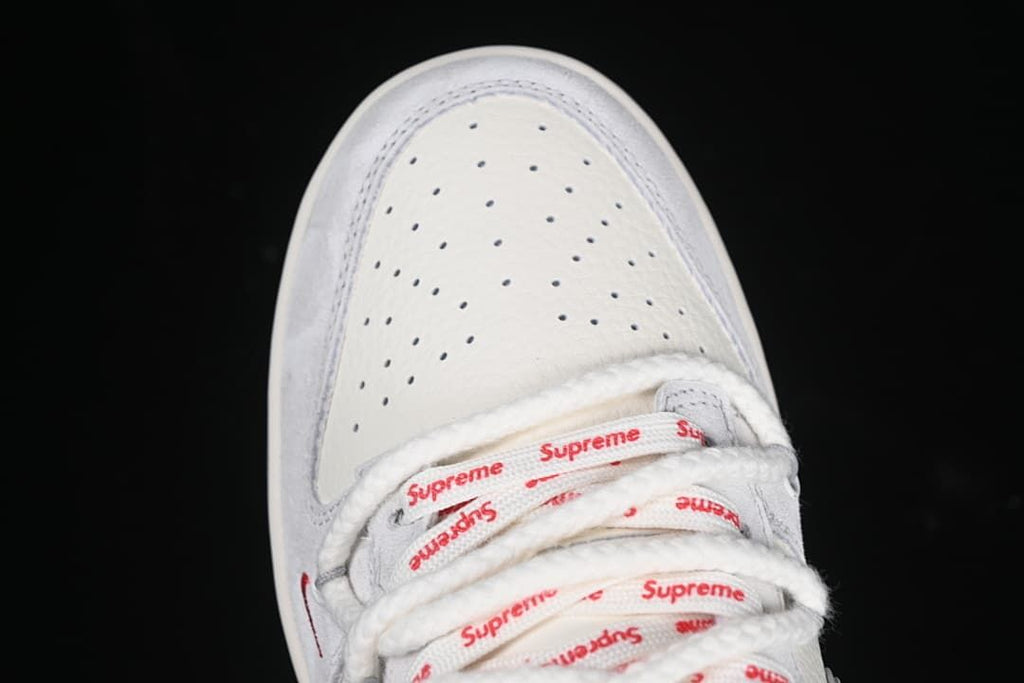 Top-down view of the perforated toe and branded laces