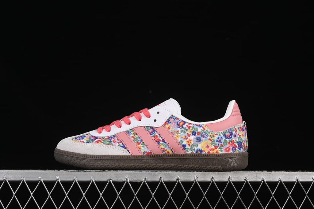 Side view of the Samba OG W sneaker with floral-print panels and pink details