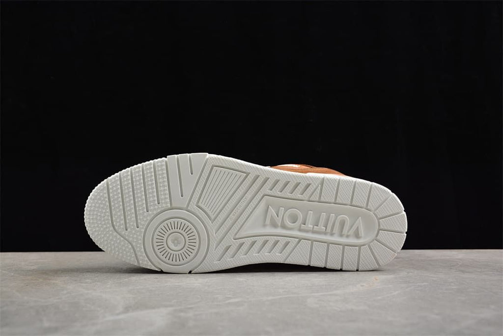 Underside of a white sneaker sole with molded tread and lettering
