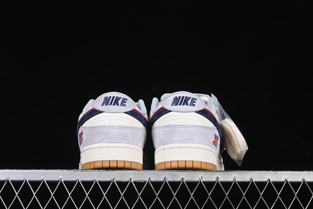 Rear view of the pair showing heel panels and Nike branding.