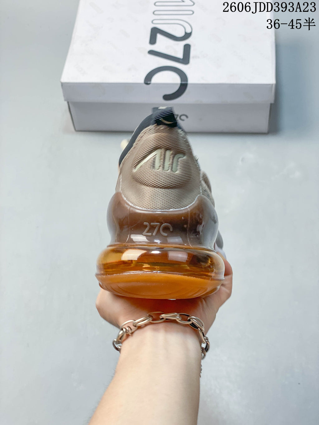 Rear view of a Nike Air Max 270 sneaker highlighting the amber-colored heel unit.