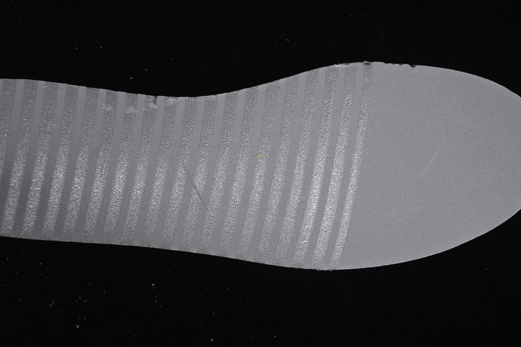 Close-up of the sneaker's black outsole tread
