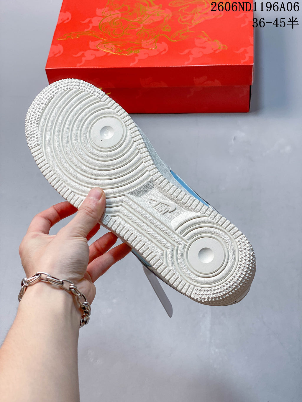 View of the off-white outsole with circular tread pattern.