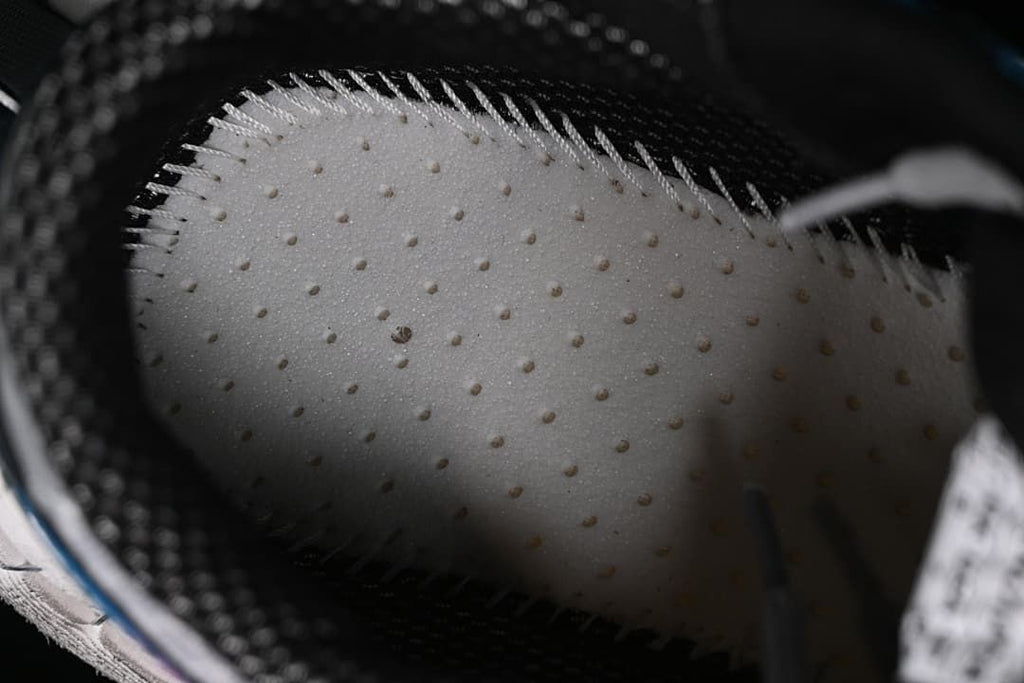 Close-up view inside the sneaker showing the footbed and lining