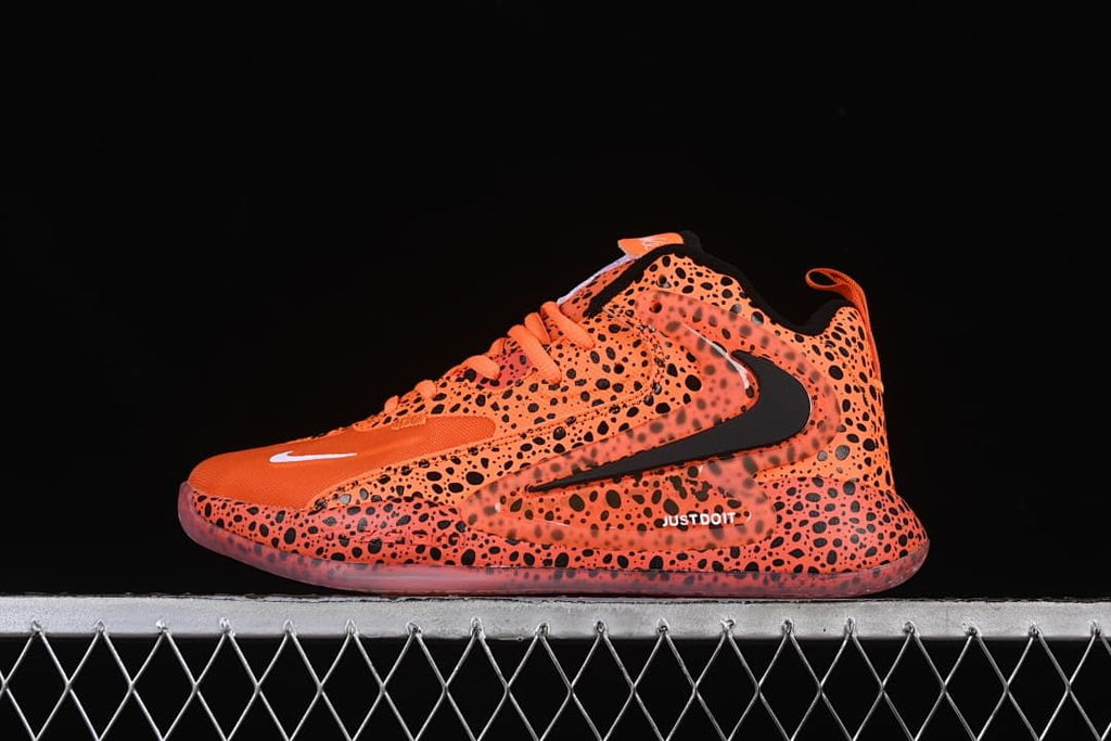 Nike Zoom HyperSet 2 SE low-top training shoe in orange and black spotted print, side view.