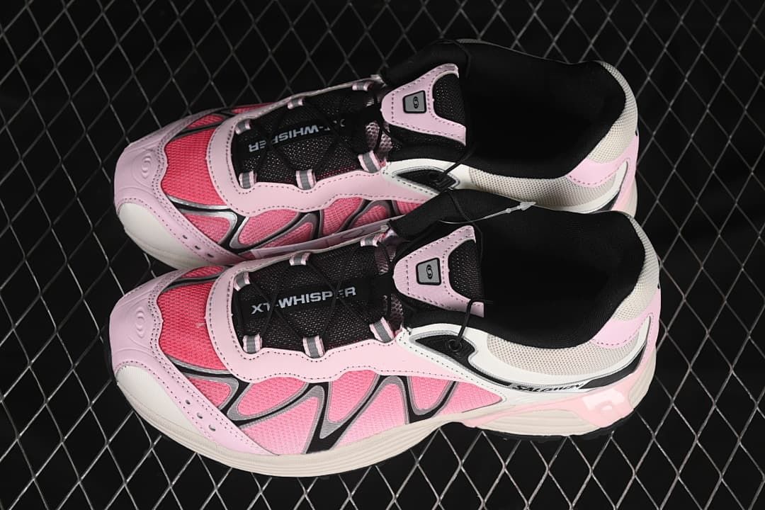 Pair of pink, off-white, and black XT-Whisper shoes viewed from above
