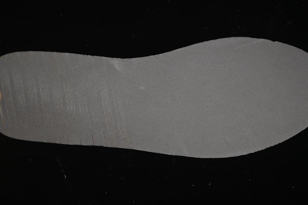 Close-up view of the grey outsole