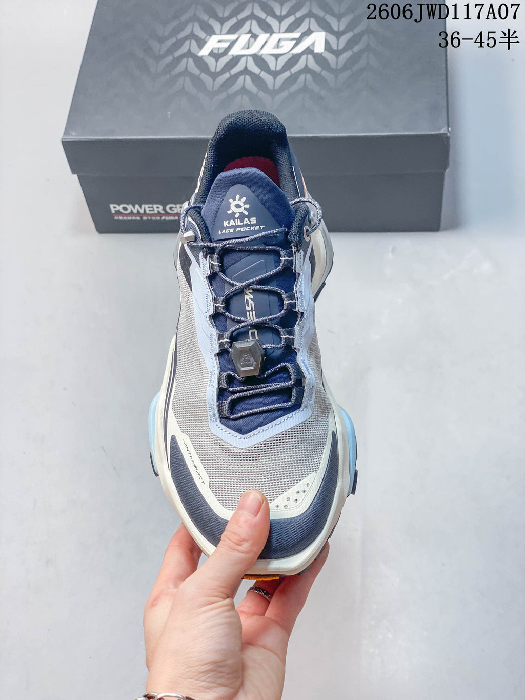 Front view showing the mesh-like upper, laces, and lace pocket
