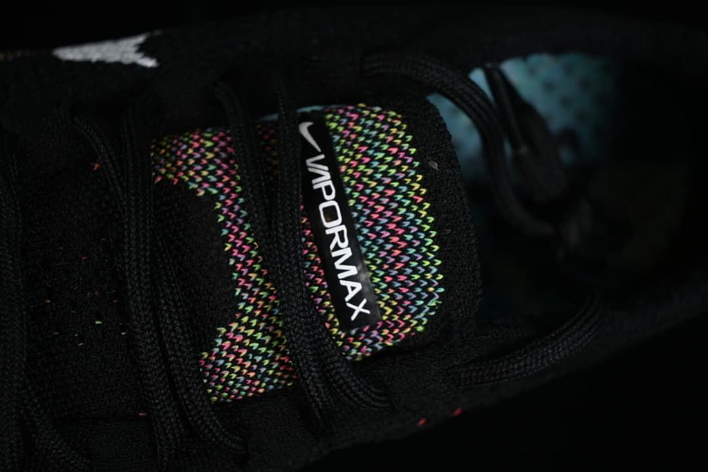 Close-up of the VaporMax tongue label and laces
