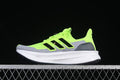 Side view of lime green and gray Ultraboost running shoe with black stripes and white midsole